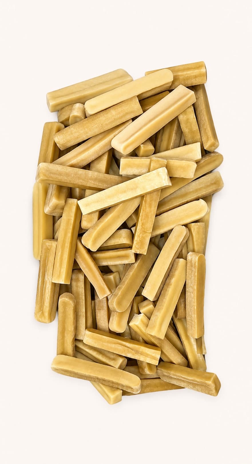 Rows of White Himalayan churpi yak cheese chews